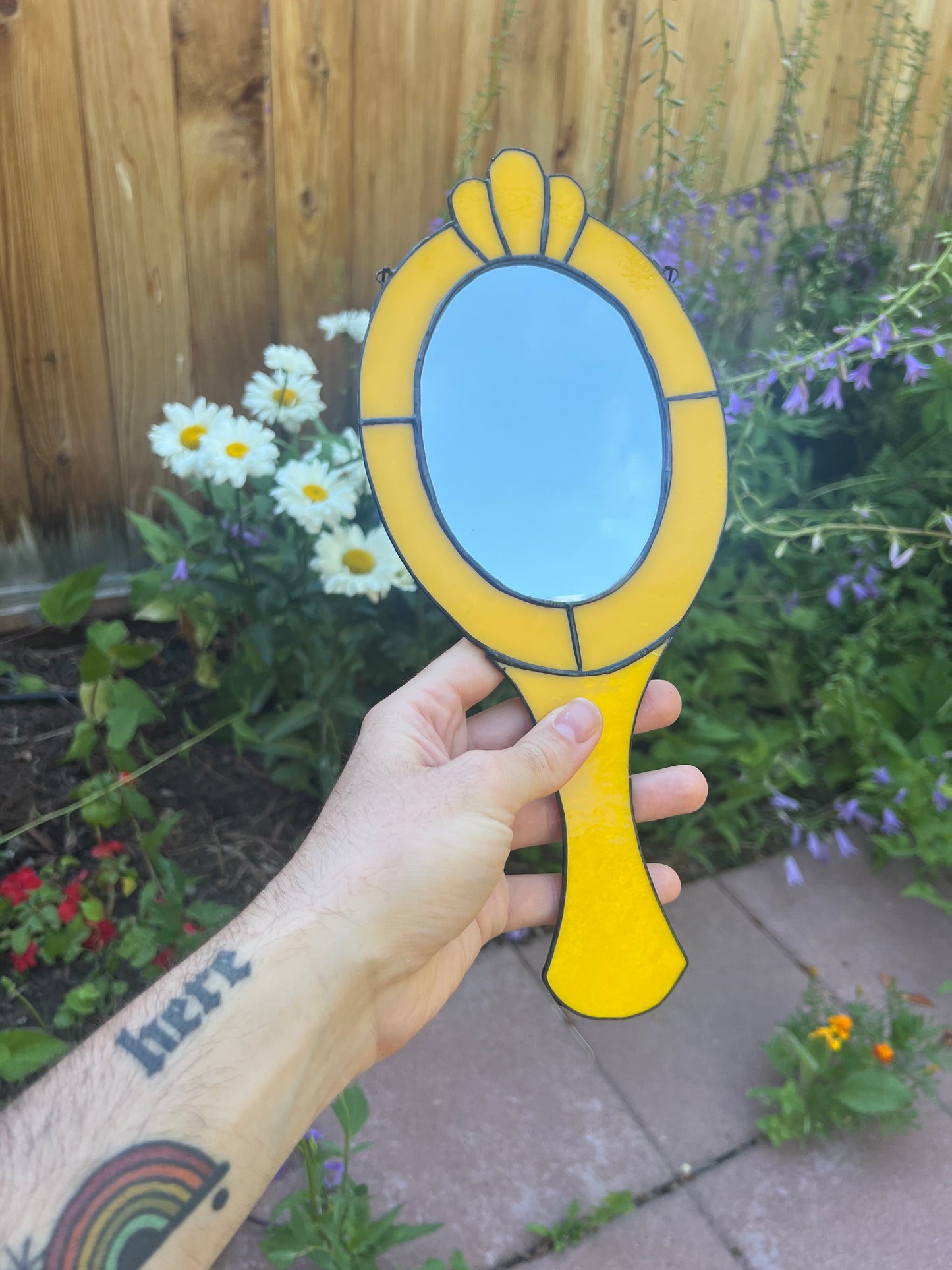 Yellow hand mirror